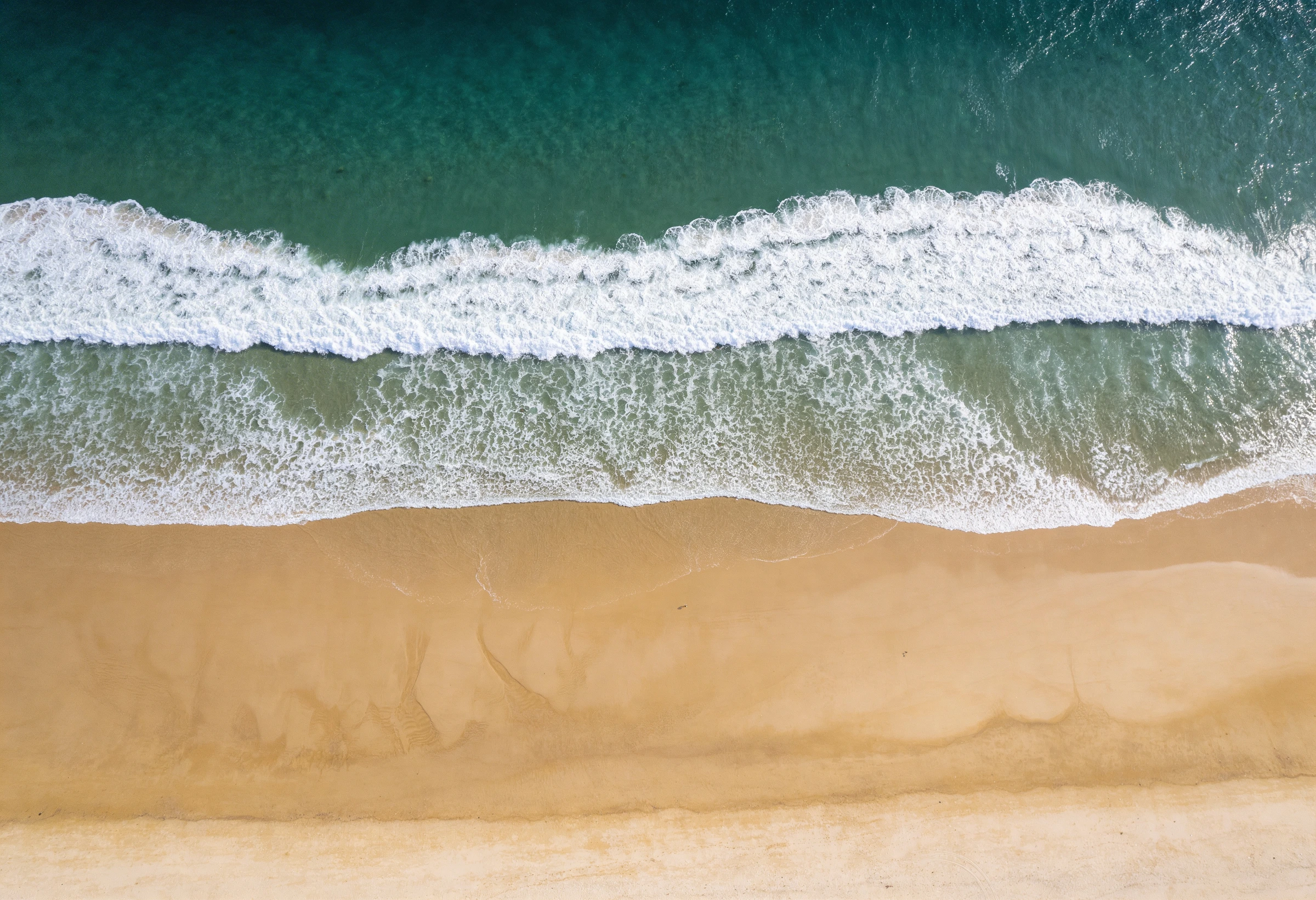 Private sandy beach at 63 West